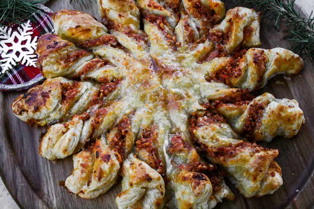 close up photo of savory romesco star bread