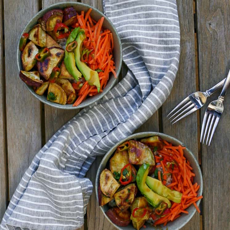 Miso Caramel Sweet Potato in a bowl with rice, carrots, avocado, and chilies