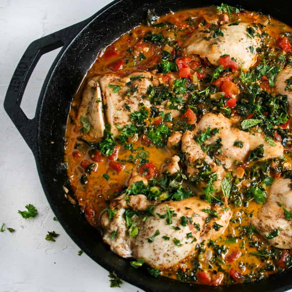 Za'atar Pan Roasted Chicken cooked in a cast iron skillet. overhead shot