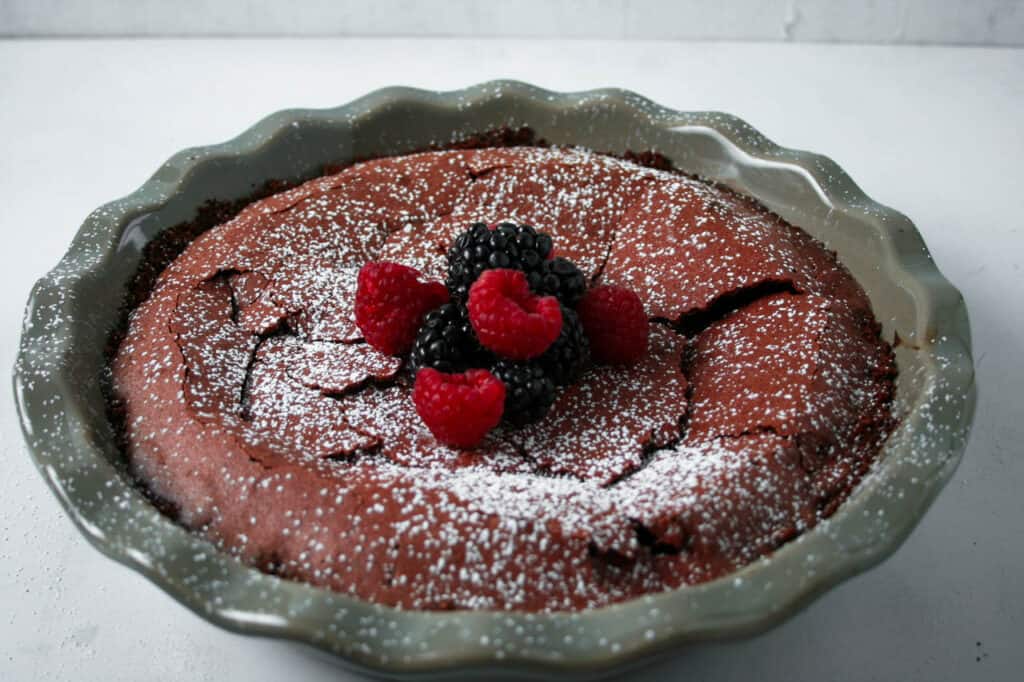 Molten Red Velvet Crack Pie with blackberries and raspberries on top