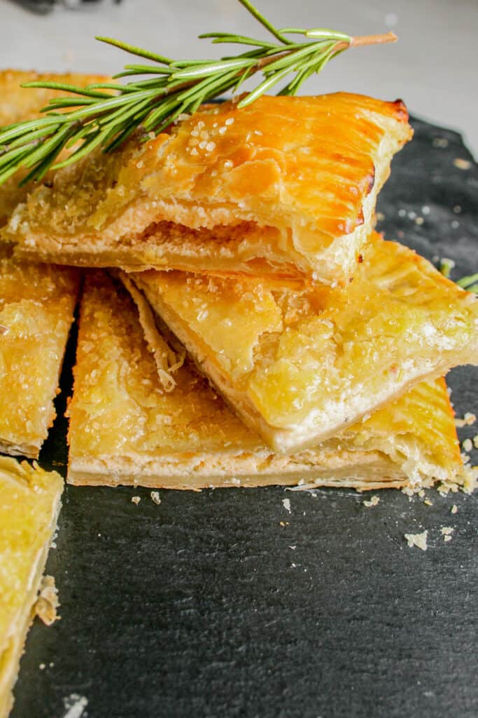 Photograph of Spiced honey whipped feta pastry. Garnished with rosemary