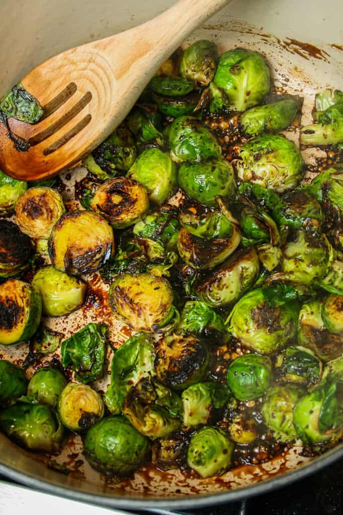 red wine pan fried Brussels sprouts cooked on stove