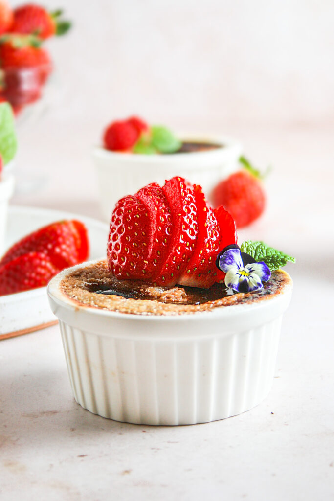 Red Velvet Creme Brulee with strawberries