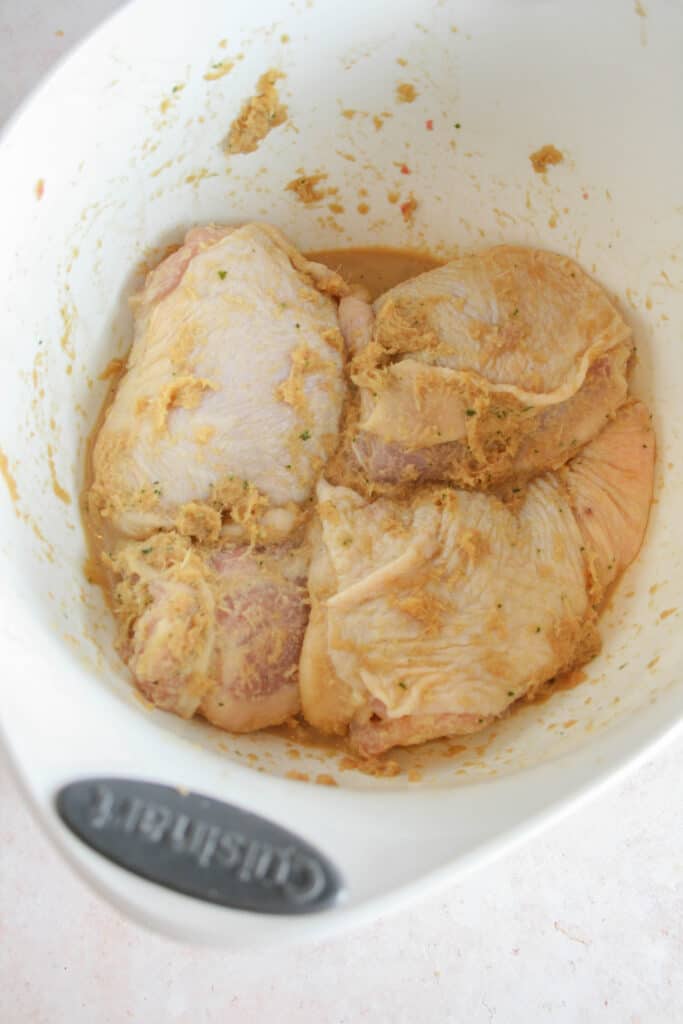 Chicken marinating in lemongrass paste
