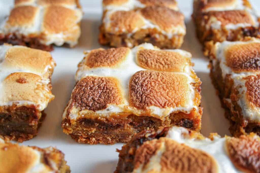 Hero photograph of pumpkin smore's bars. photographed on a white tray