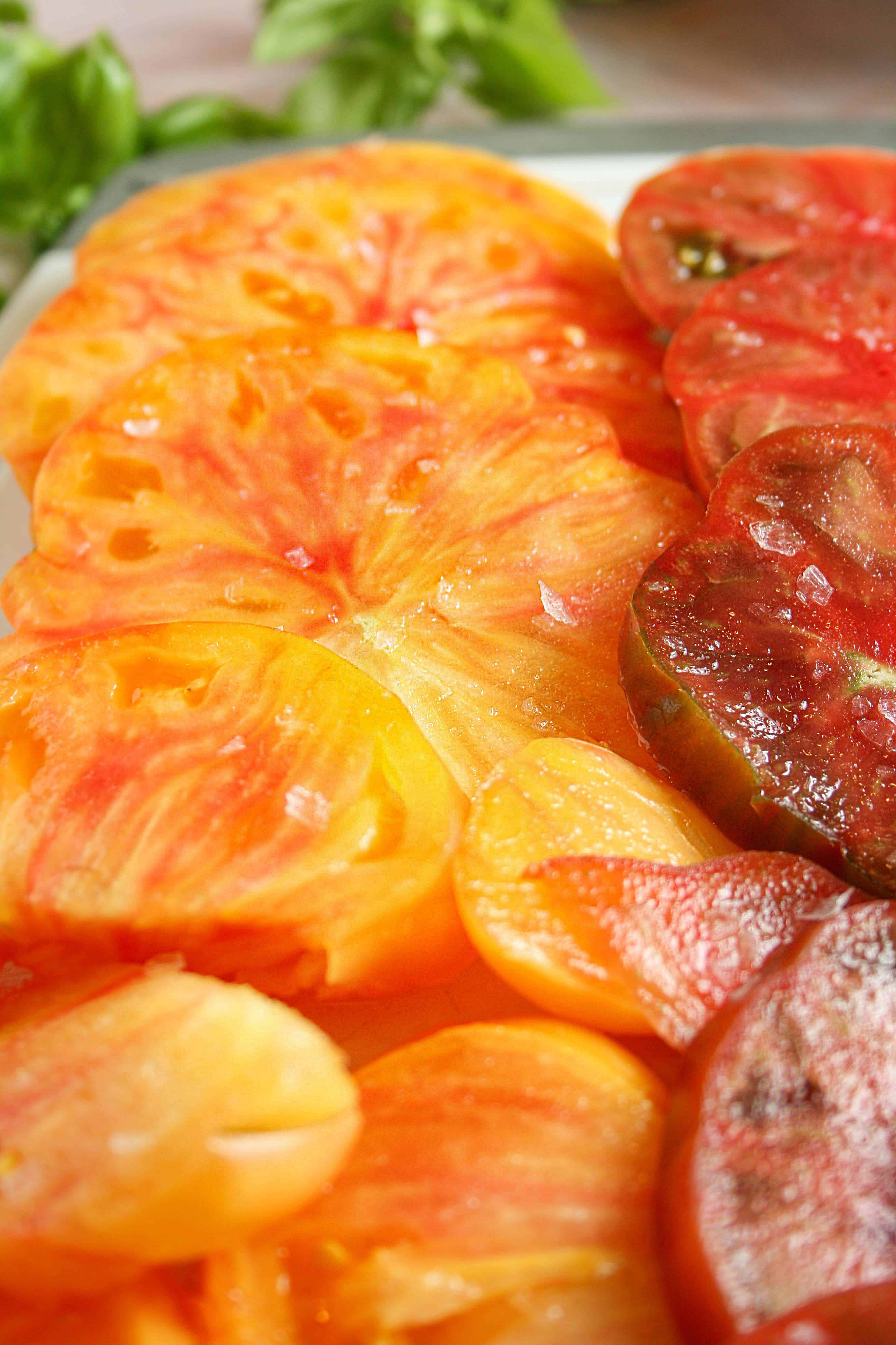 photograph of sliced heirloom tomatoes