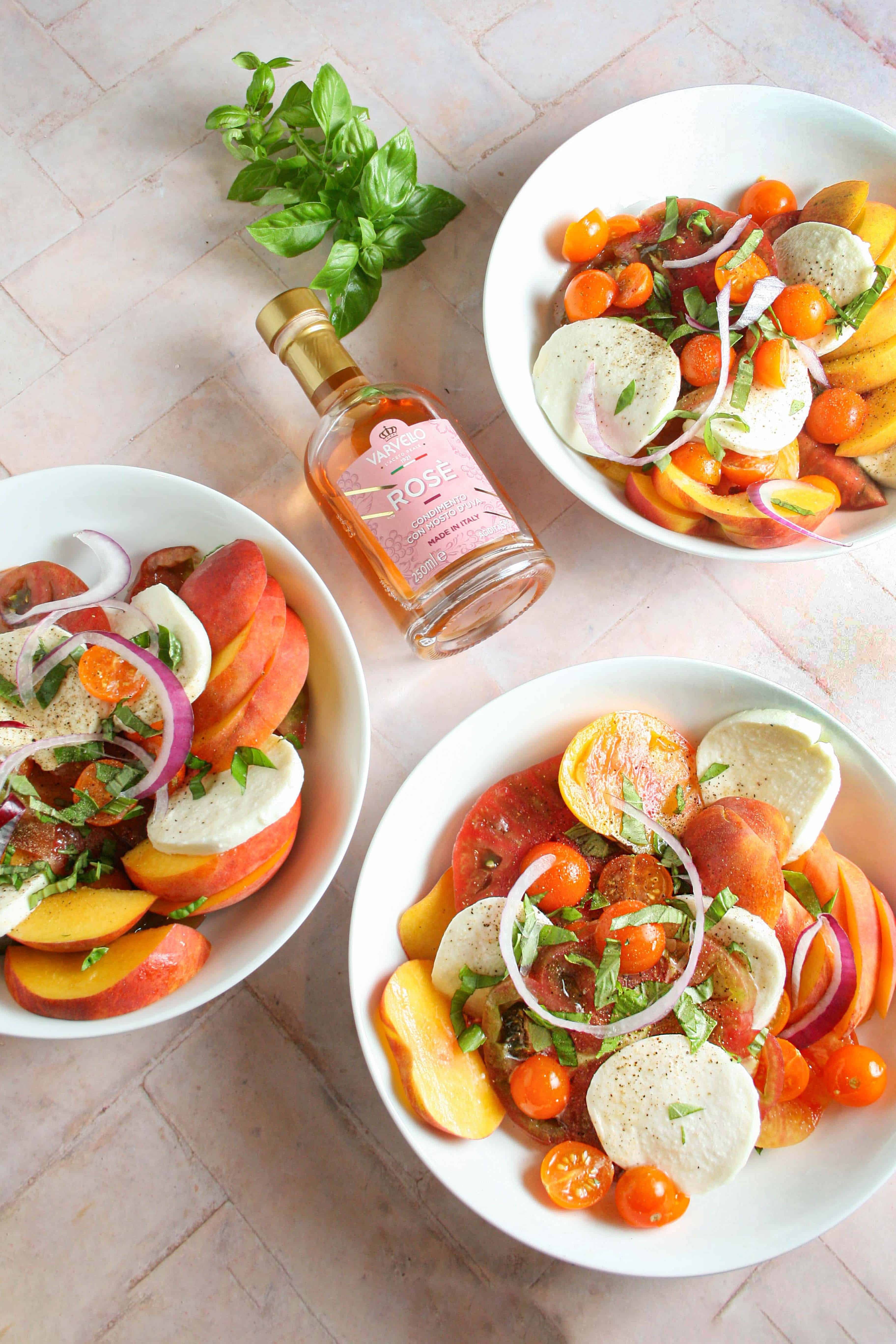 Overhead photograph of stone fruit caprese salad