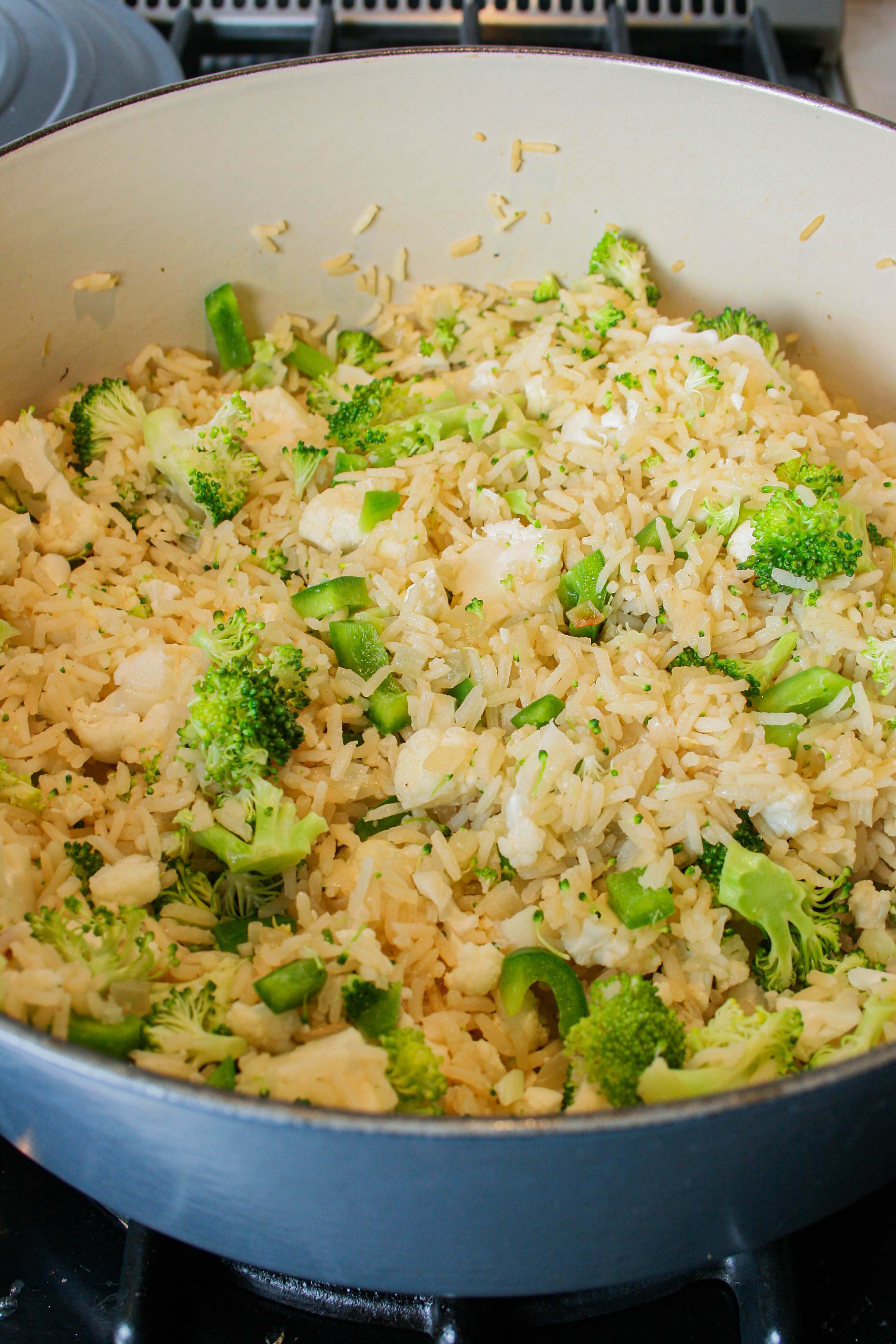 Vegetables added to cooked rice pilaf