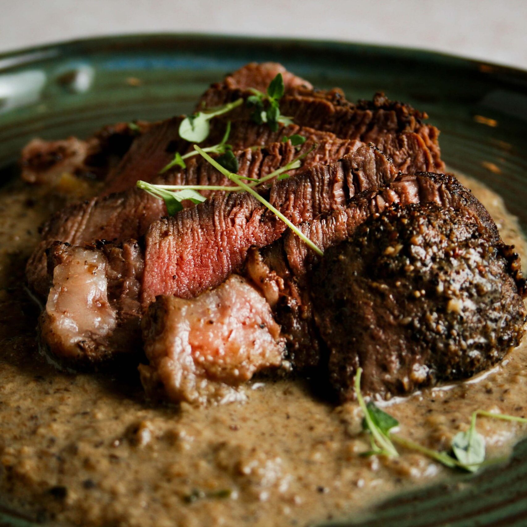 Filet with creamy mushroom sauce and thyme
