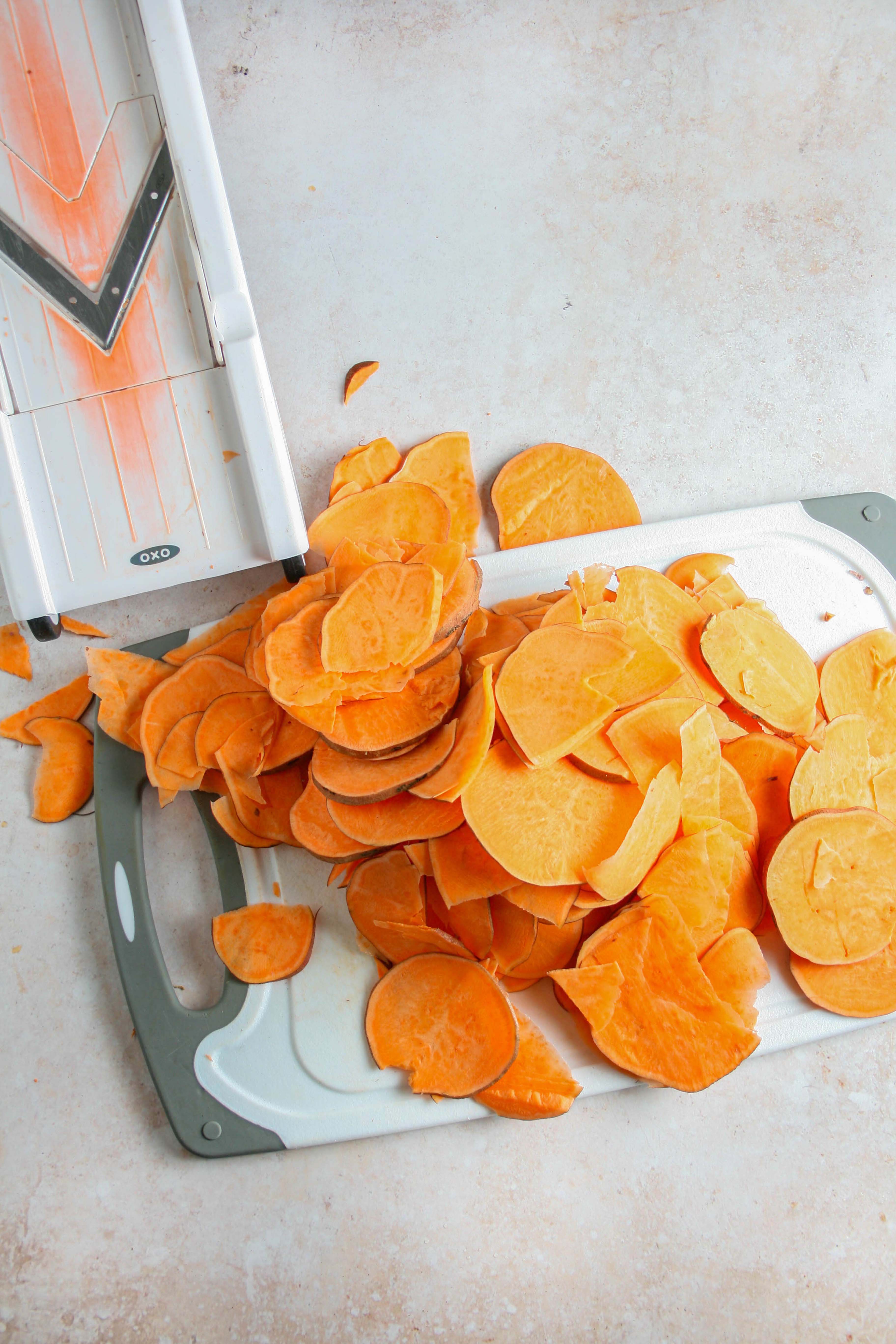 Sweet potatoes sliced using a mandolin